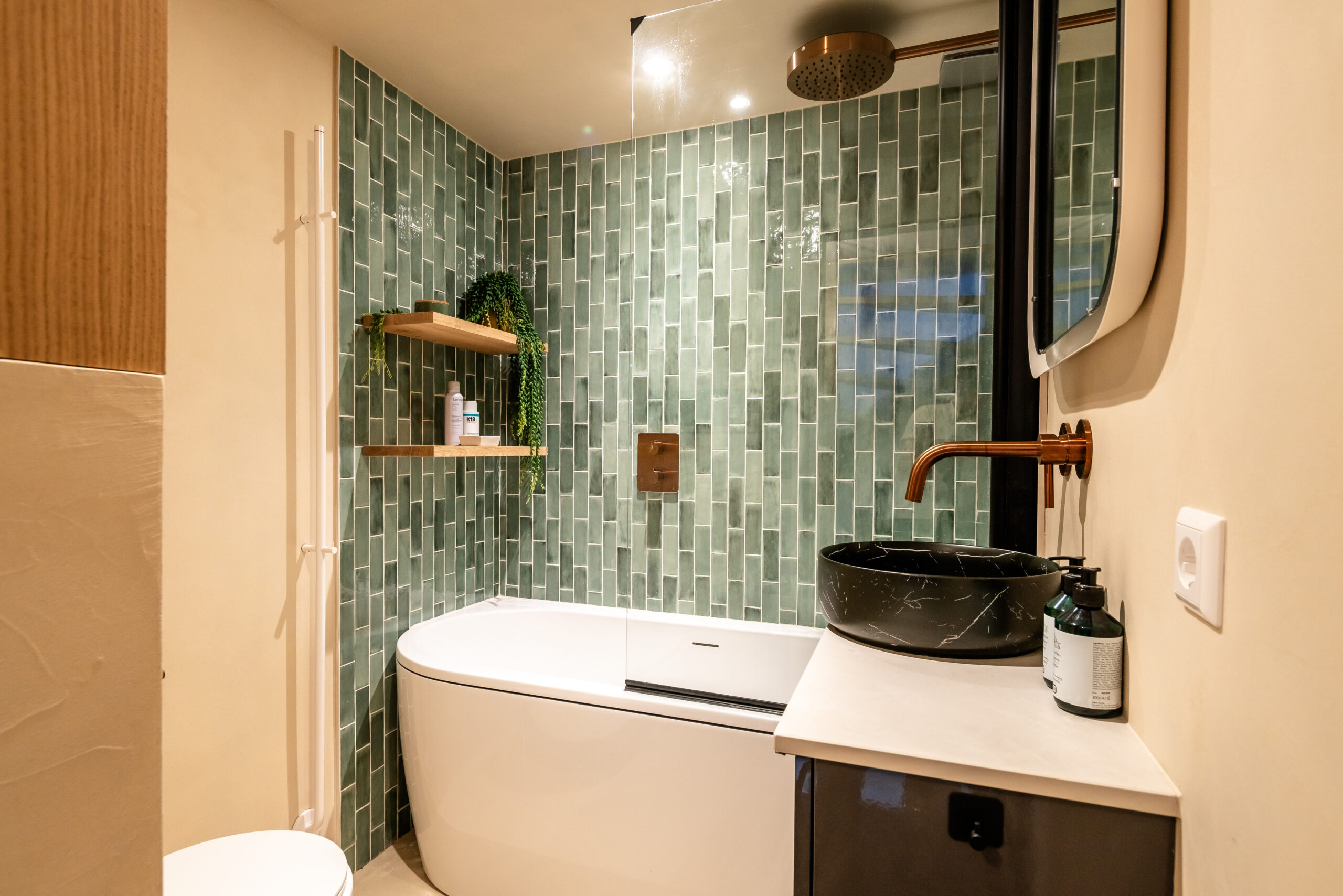 mini bathroom with bathtub